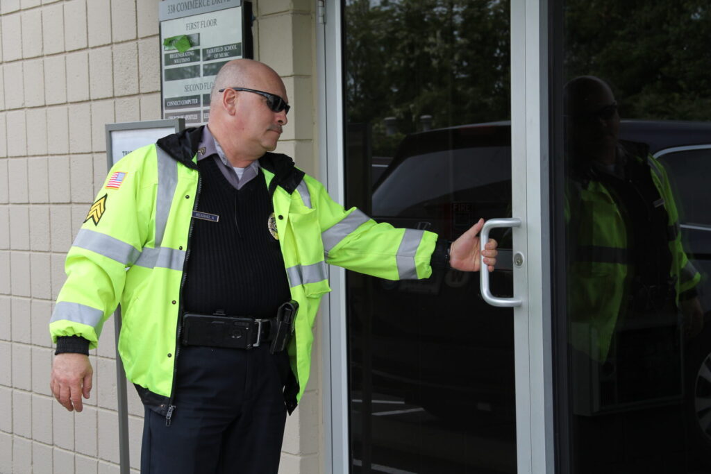 A Guard Performing Premise Scheduled Closing for Businesses in Connecticut